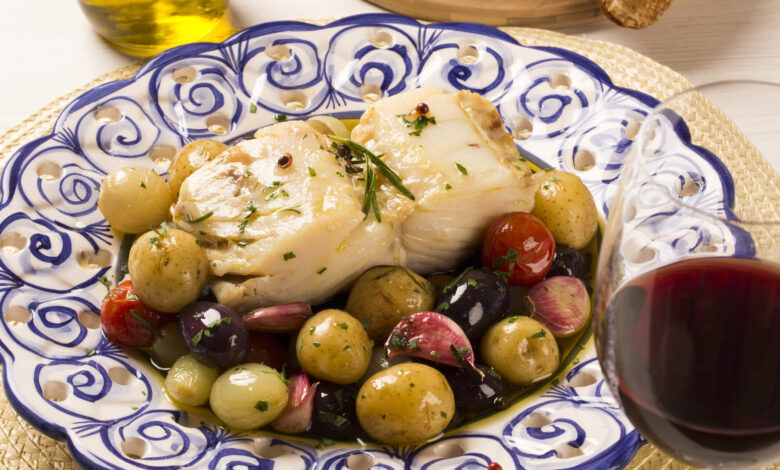A,Typical,Portuguese,Dish,With,Codfish,Called,Bacalhau,Do,Porto baked cod with potatoes, a traditional dish of Portuguese cuisine