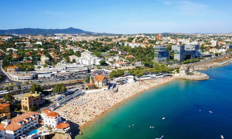 Aerial,Fly,Over,People,Crowd,Having,Fun,On,Beach,And cascais beaches